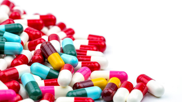Selective focus of antibiotic capsules pills on blur background