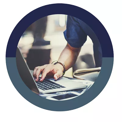 Logo with man clicking on a computer