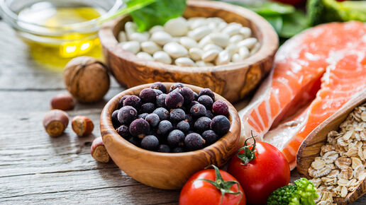 Picture of food including cherry tomatoes, dried fruits, salmon