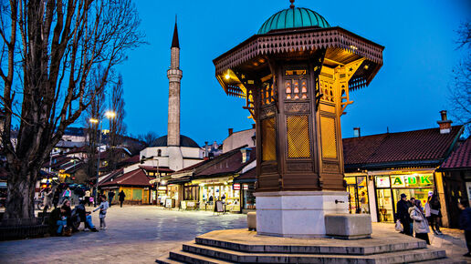 Sebilj fountain in Pigeon Square, Bascarsija quarter by evening in lights, Sarajevo, Bosnia and Herzegovina